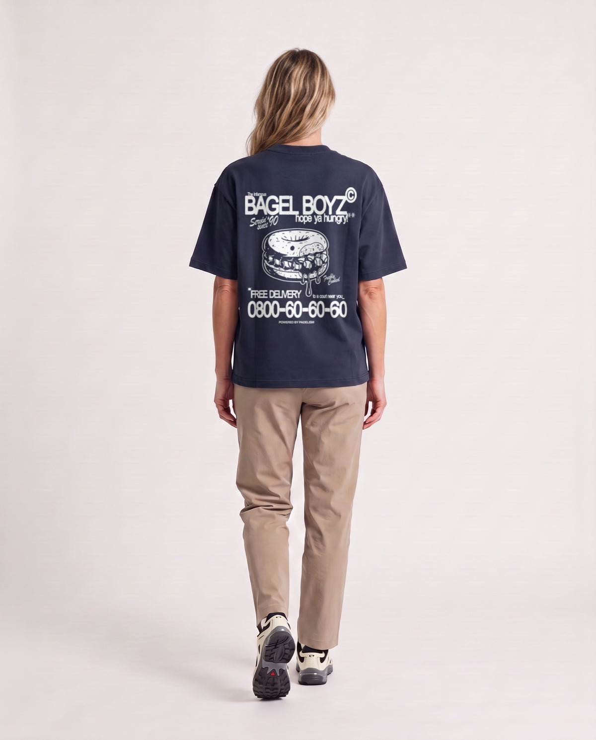 Bagel Boyz - Heavyweight T-shirt in Navy, worn on model, woman, back walk