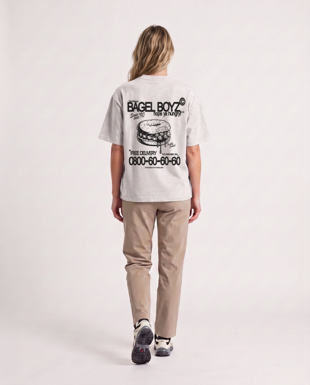 Bagel Boyz - Heavyweight T-shirt in Oat Gray, worn on model, woman, back walk