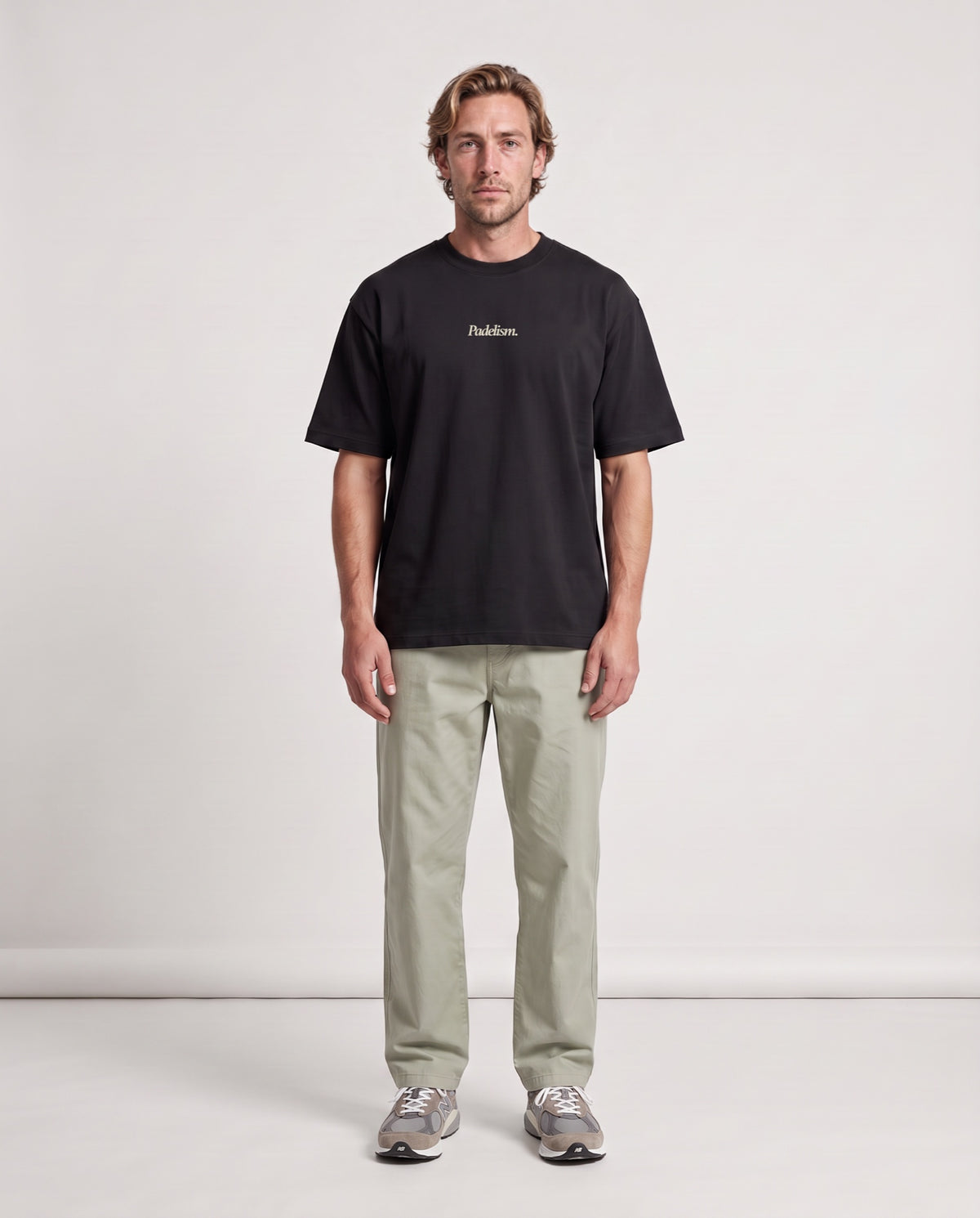 Classic CC - Heavyweight T-shirt in Black, worn on model, man, front