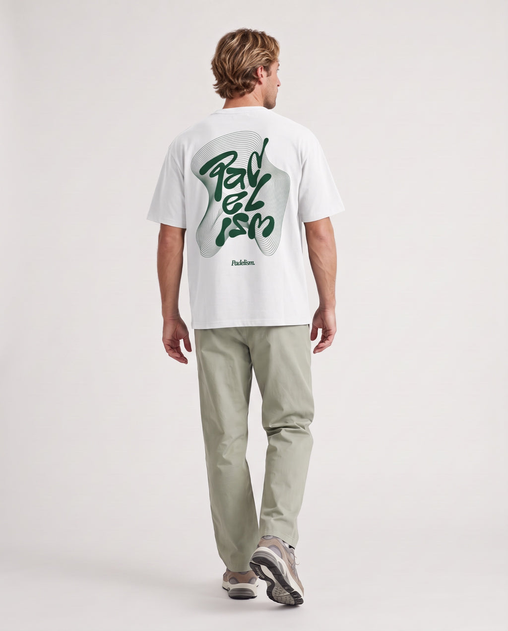 Flow - Heavyweight T-Shirt in White, worn on model, man, back walk