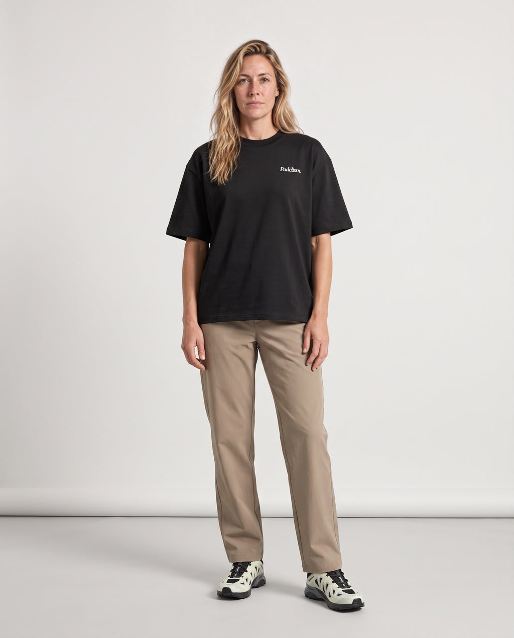 LNPC - Heavyweight T-Shirt in Black, worn on model, woman, front
