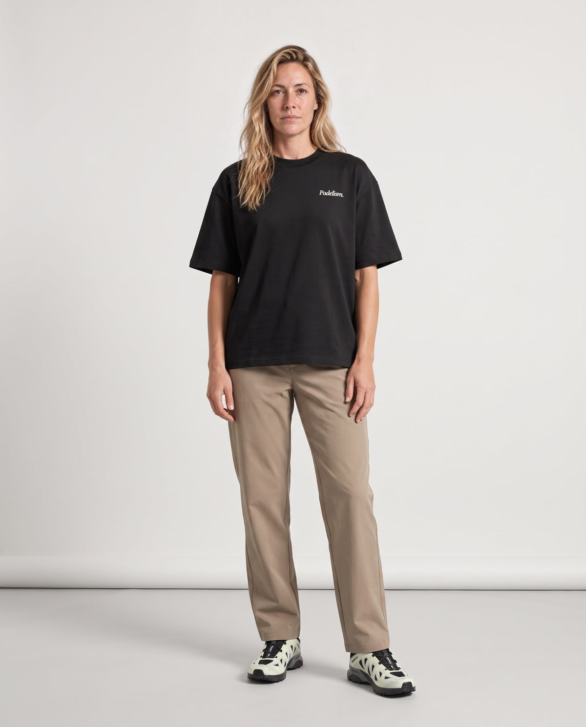 LNPC - Heavyweight T-Shirt in Black, worn on model, woman, front
