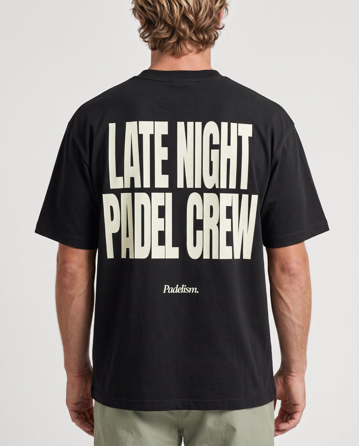 LNPC - Heavyweight T-Shirt in Black, worn on model, man, back close