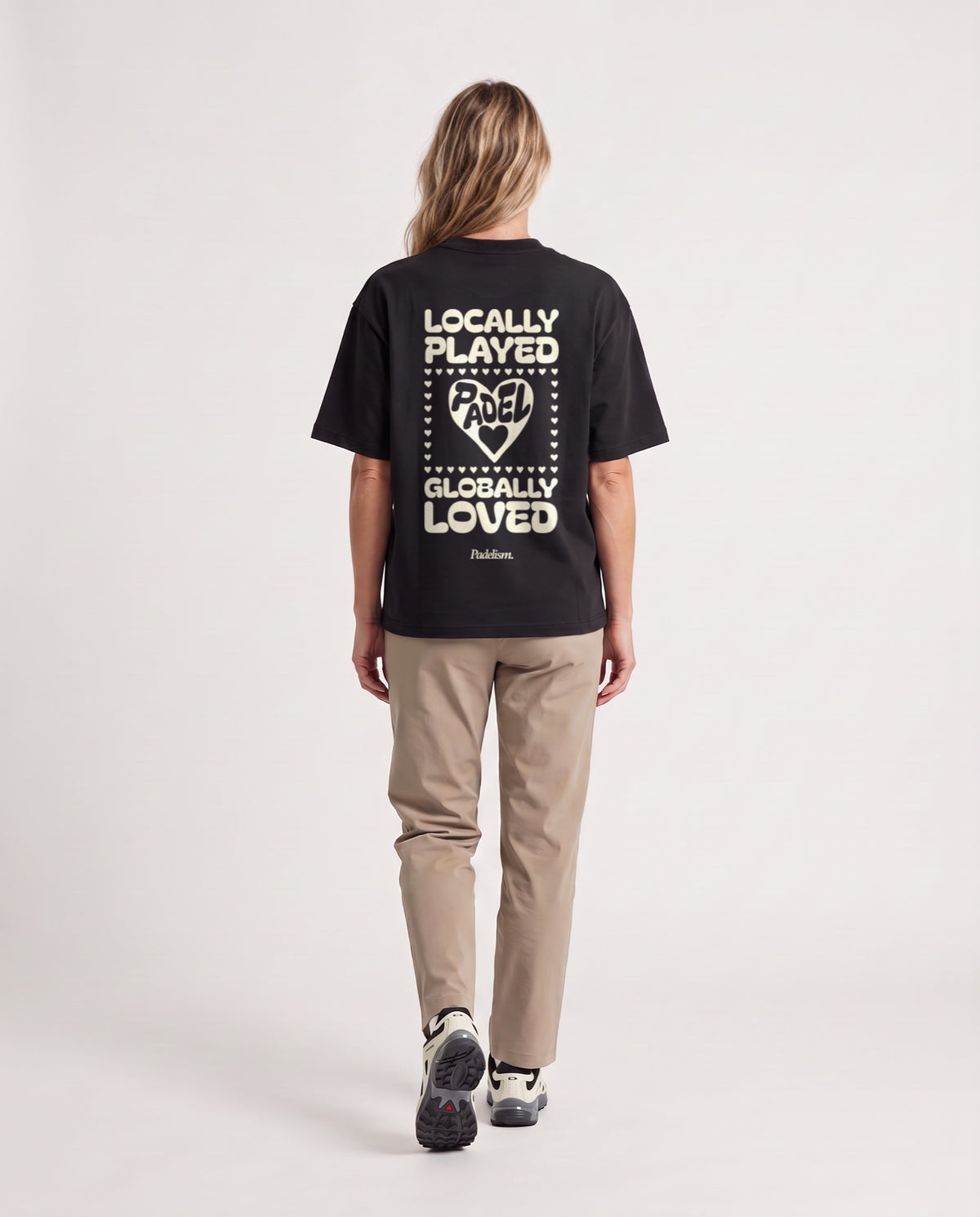Love - Heavyweight T-Shirt in Black, worn on model, woman, back walk