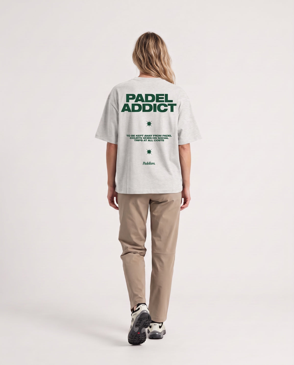 Padel Addict - Heavyweight T-Shirt in Oat Gray, worn on model, woman, back walk