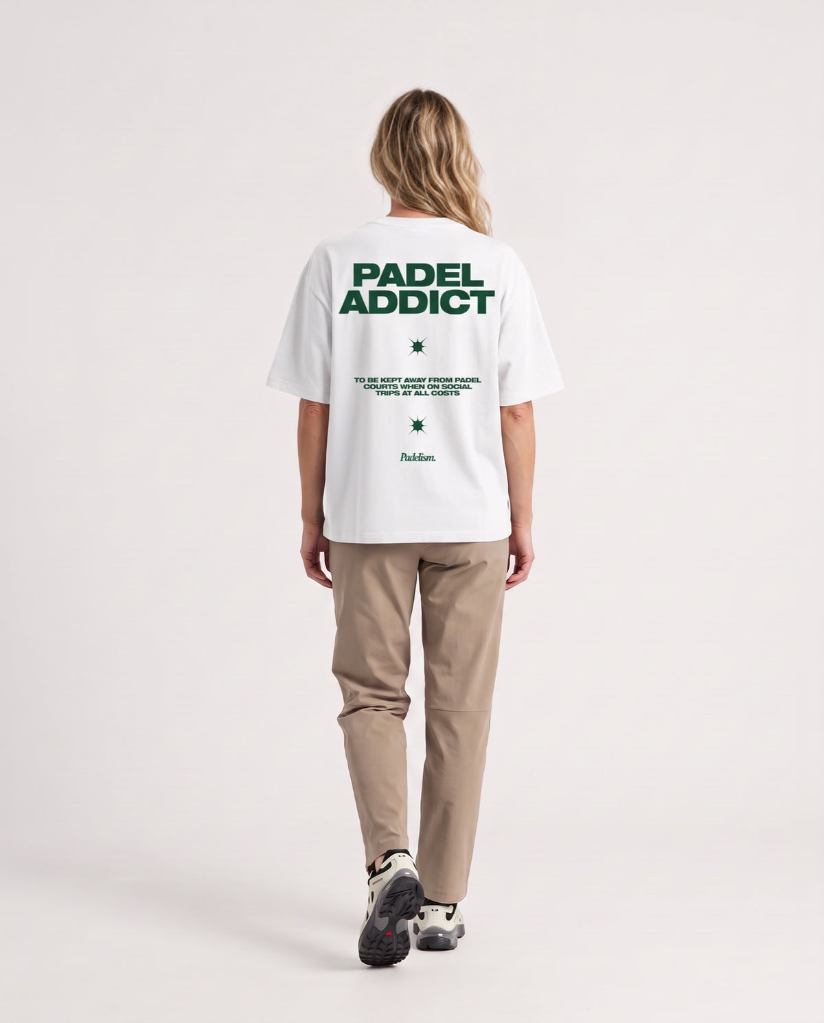 Padel Addict - Heavyweight T-Shirt in White, worn on model, woman, back walk