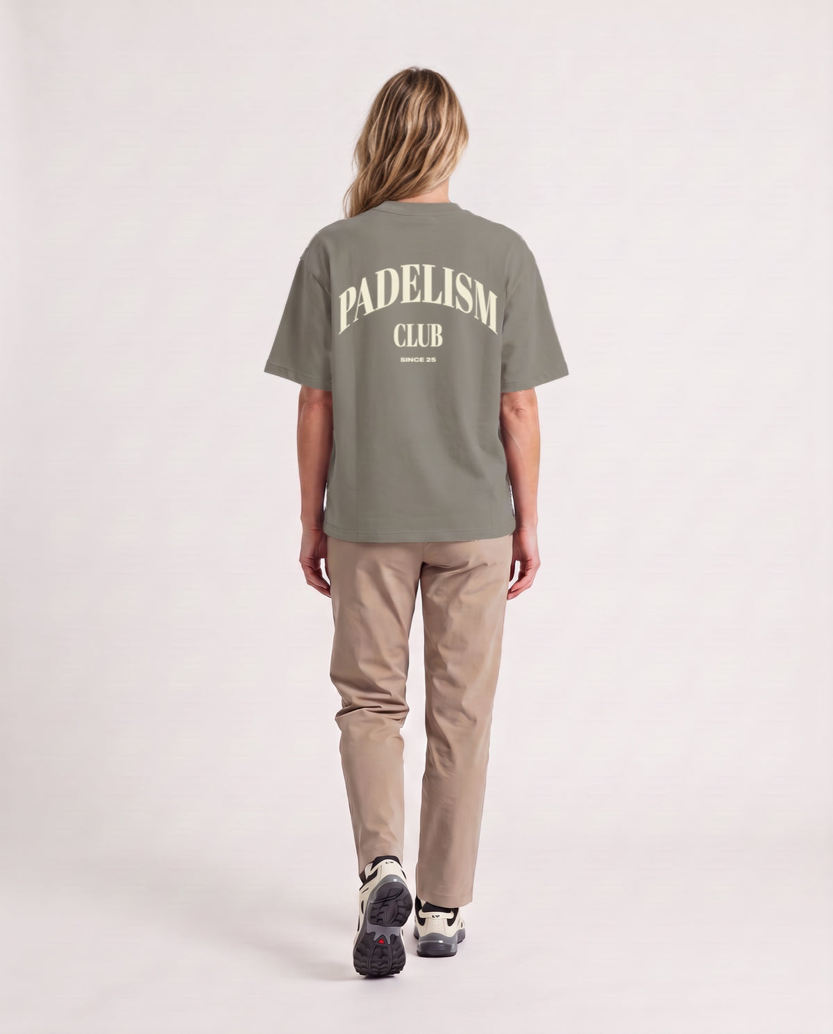 Padelism Club 25 - Heavyweight T-Shirt in Gray Camel, worn on model, woman, back walk