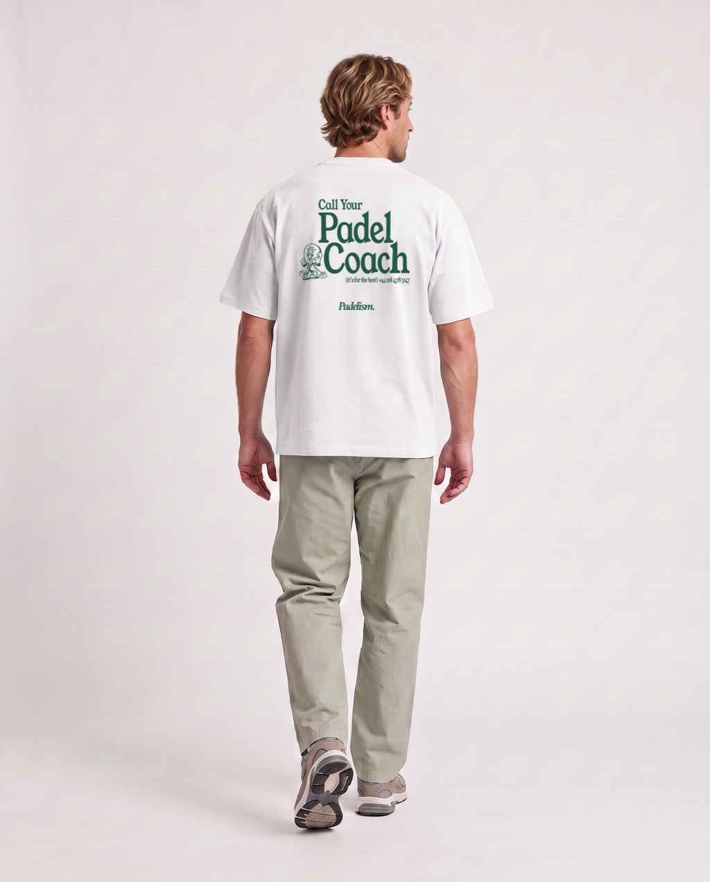 Padel Coach - Heavyweight T-Shirt in White, worn on model, man, back walk