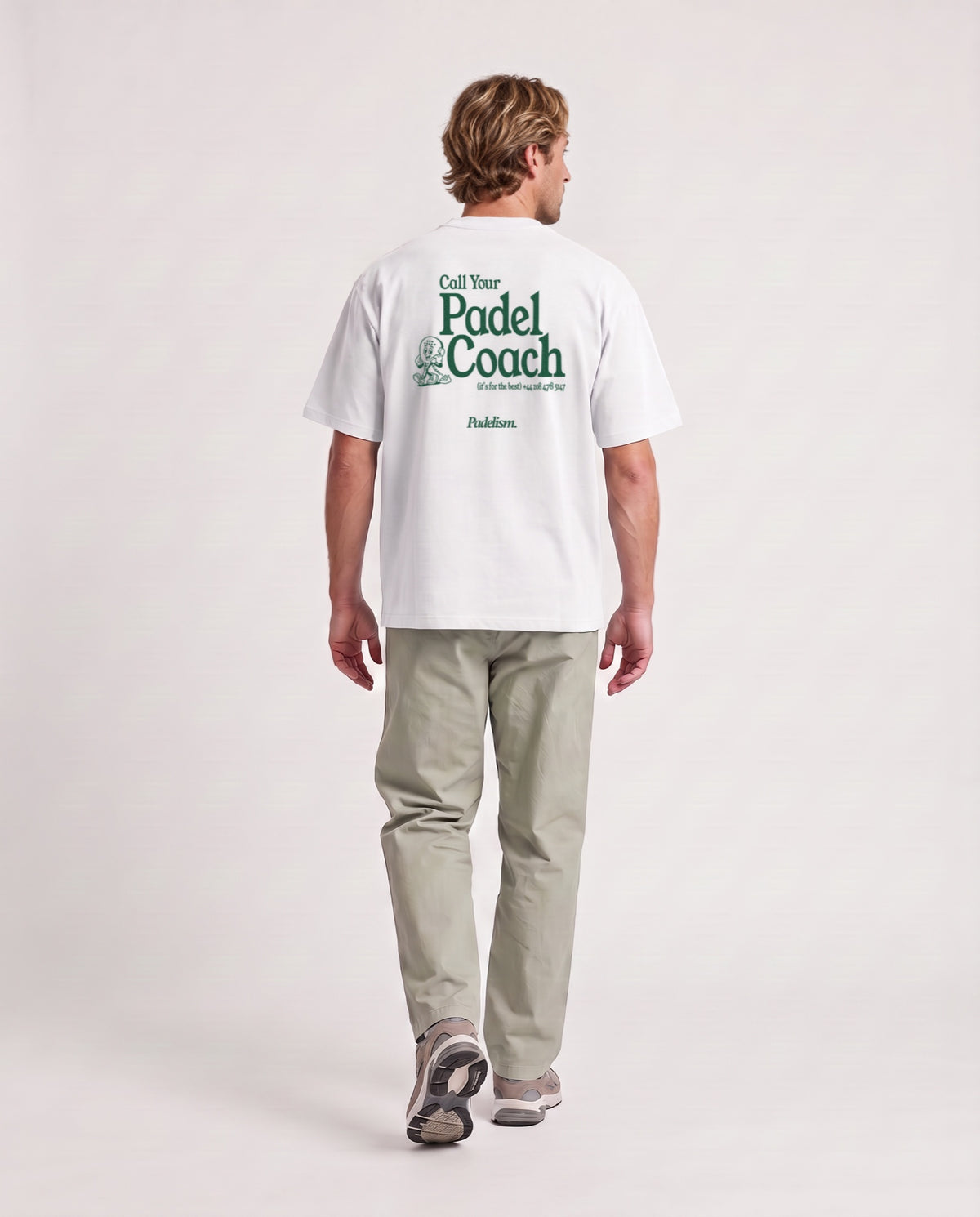 Padel Coach - Heavyweight T-Shirt in White, worn on model, man, back walk