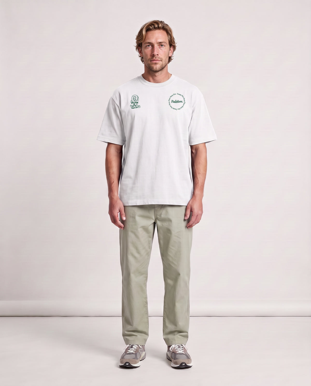 Padel Coach - Heavyweight T-Shirt in White, worn on model, man, front