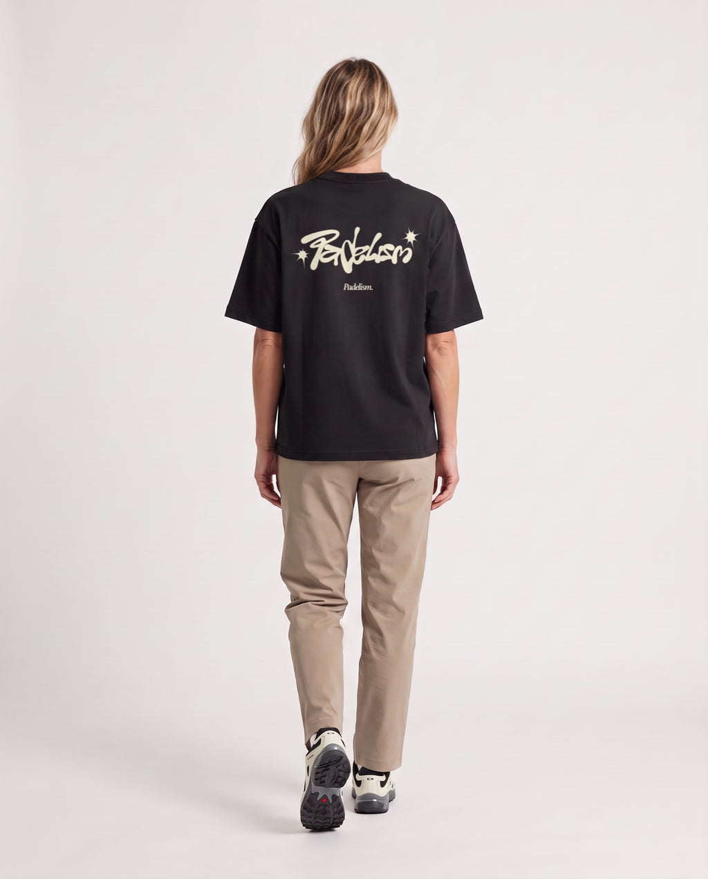 Vibe - Heavyweight T-Shirt in Black, worn on model, woman, back walk