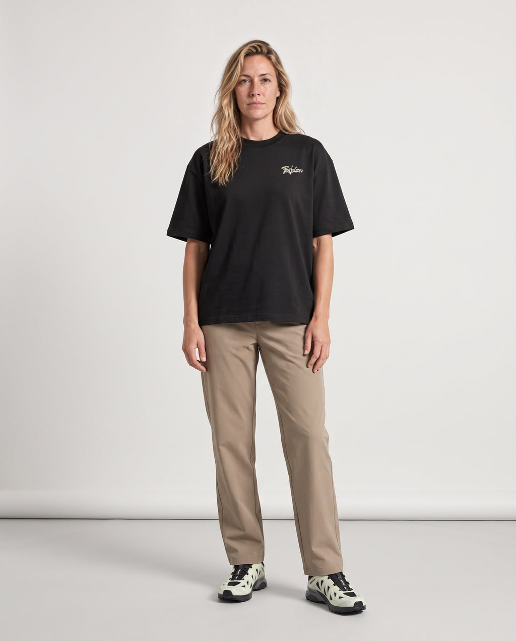 Vibe - Heavyweight T-Shirt in Black, worn on model, woman, front