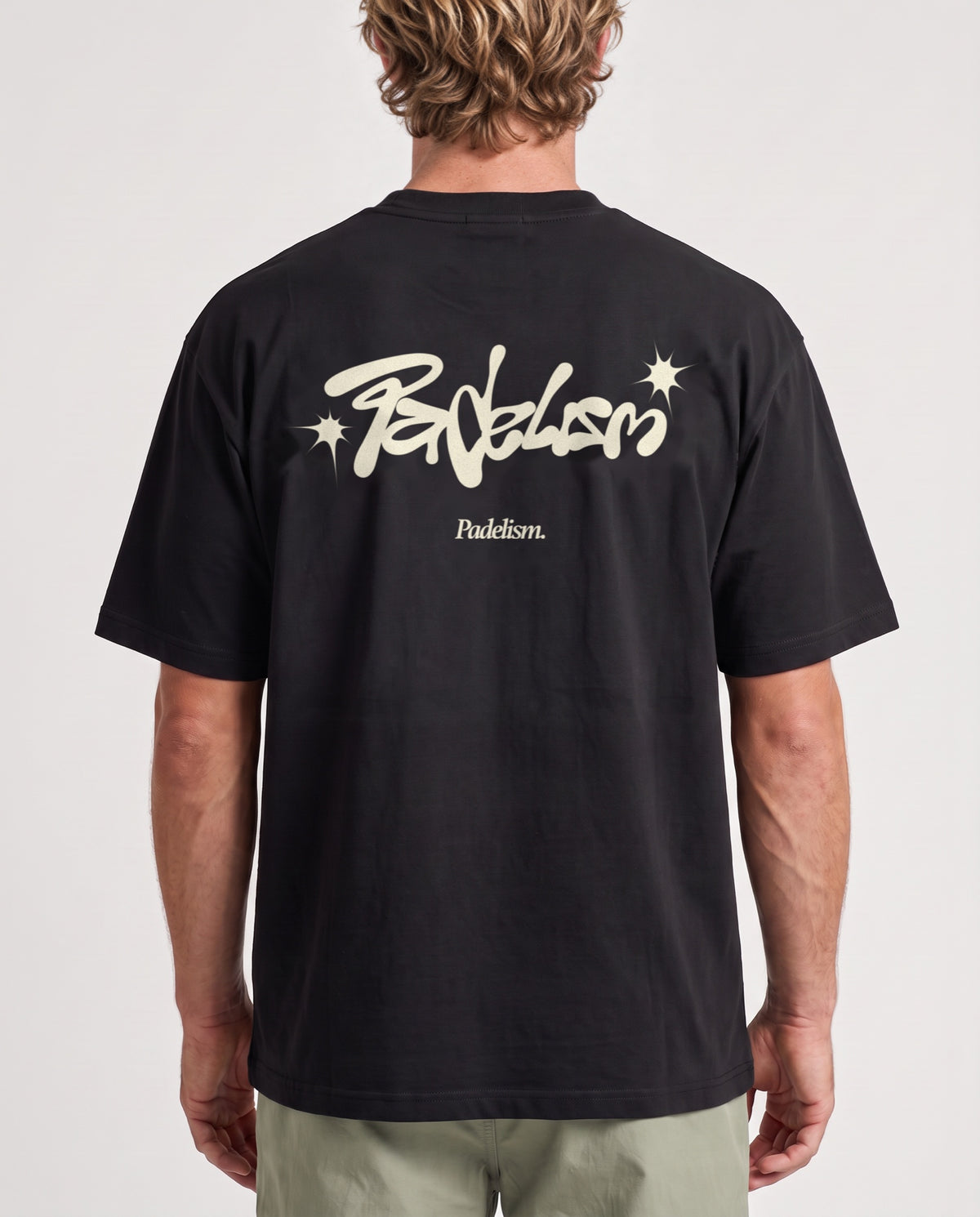 Vibe - Heavyweight T-Shirt in Black, worn on model, man, back close