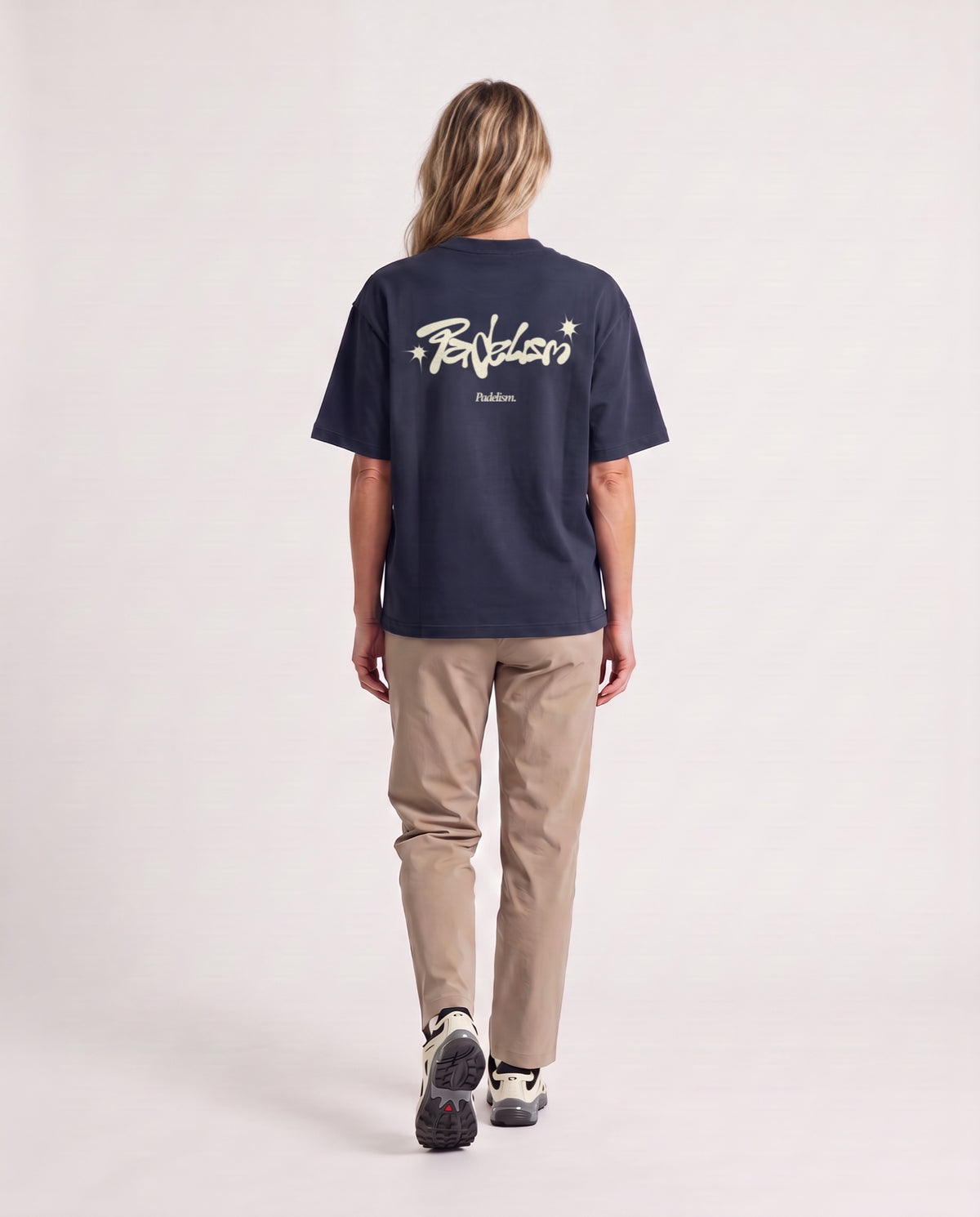 Vibe - Heavyweight T-Shirt in Navy, worn on model, woman, back walk