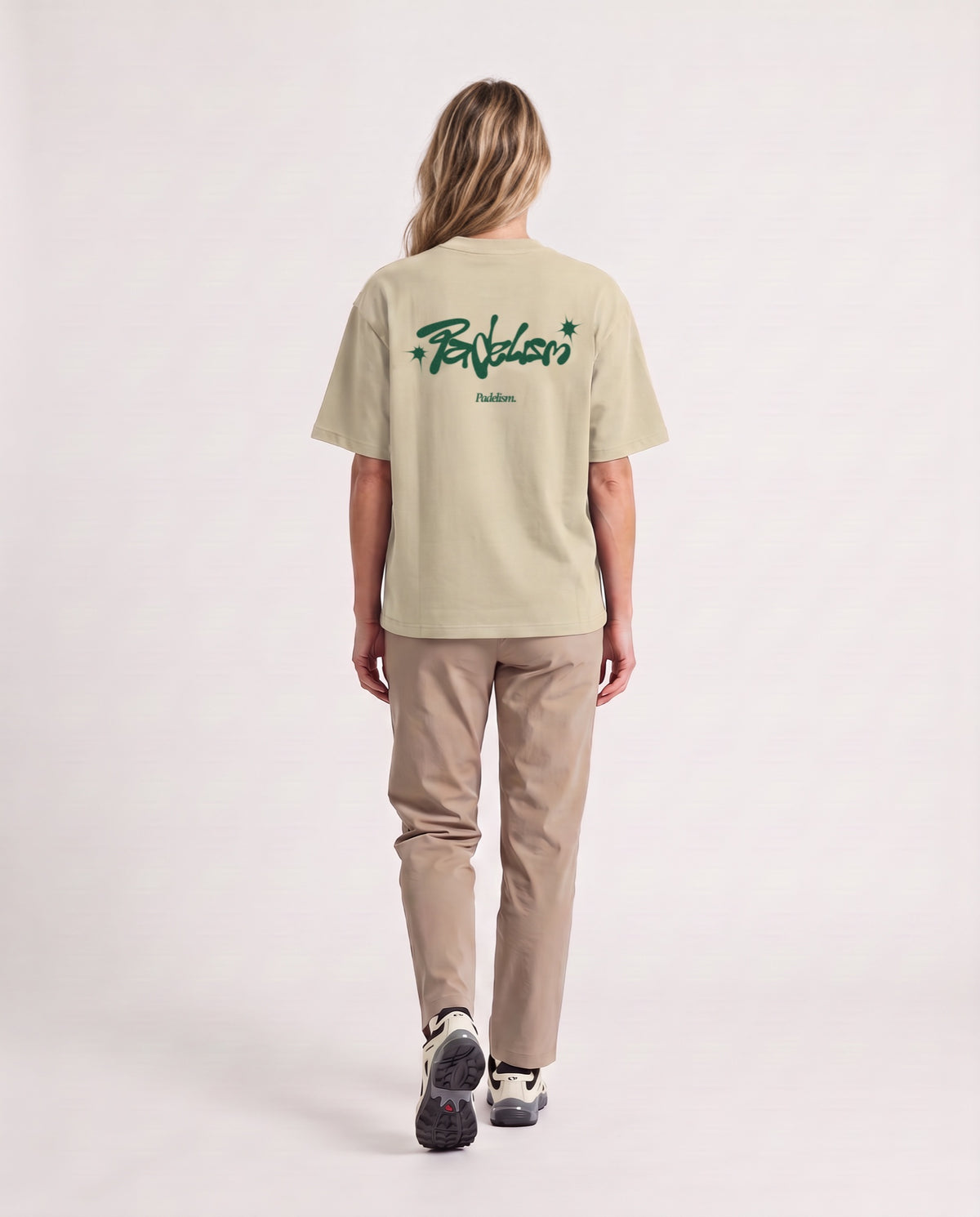 Vibe - Heavyweight T-Shirt in Sand Color, worn on model, woman, back walk