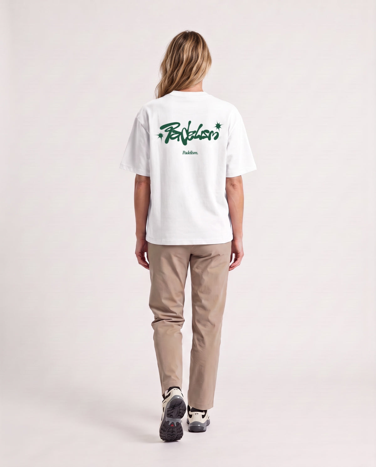 Vibe - Heavyweight T-Shirt in White, worn on model, woman, back walk